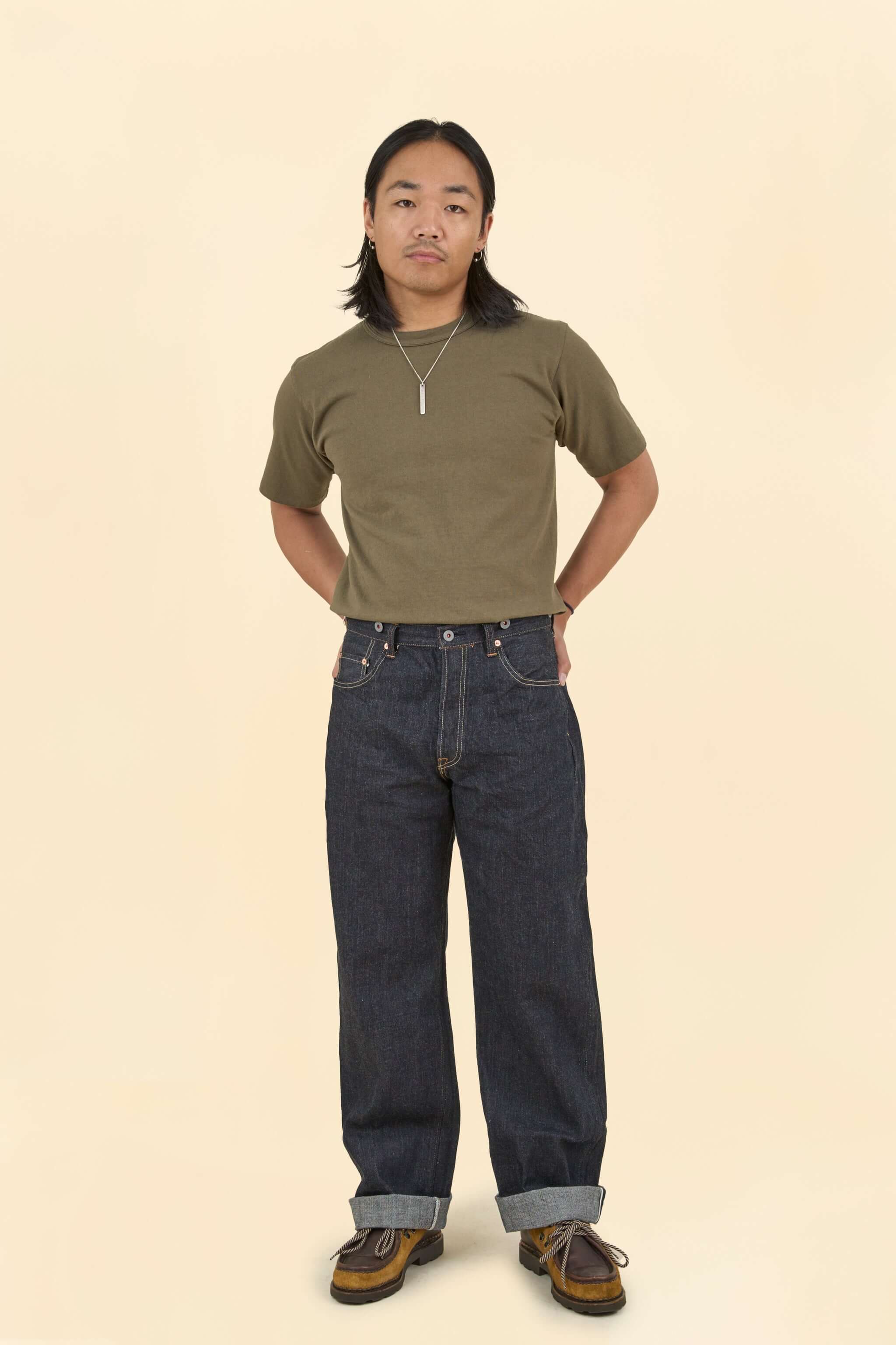 Graph Zero Heritage Denim - 13oz model wearing wide straight silhouette with t-shirt and shoes