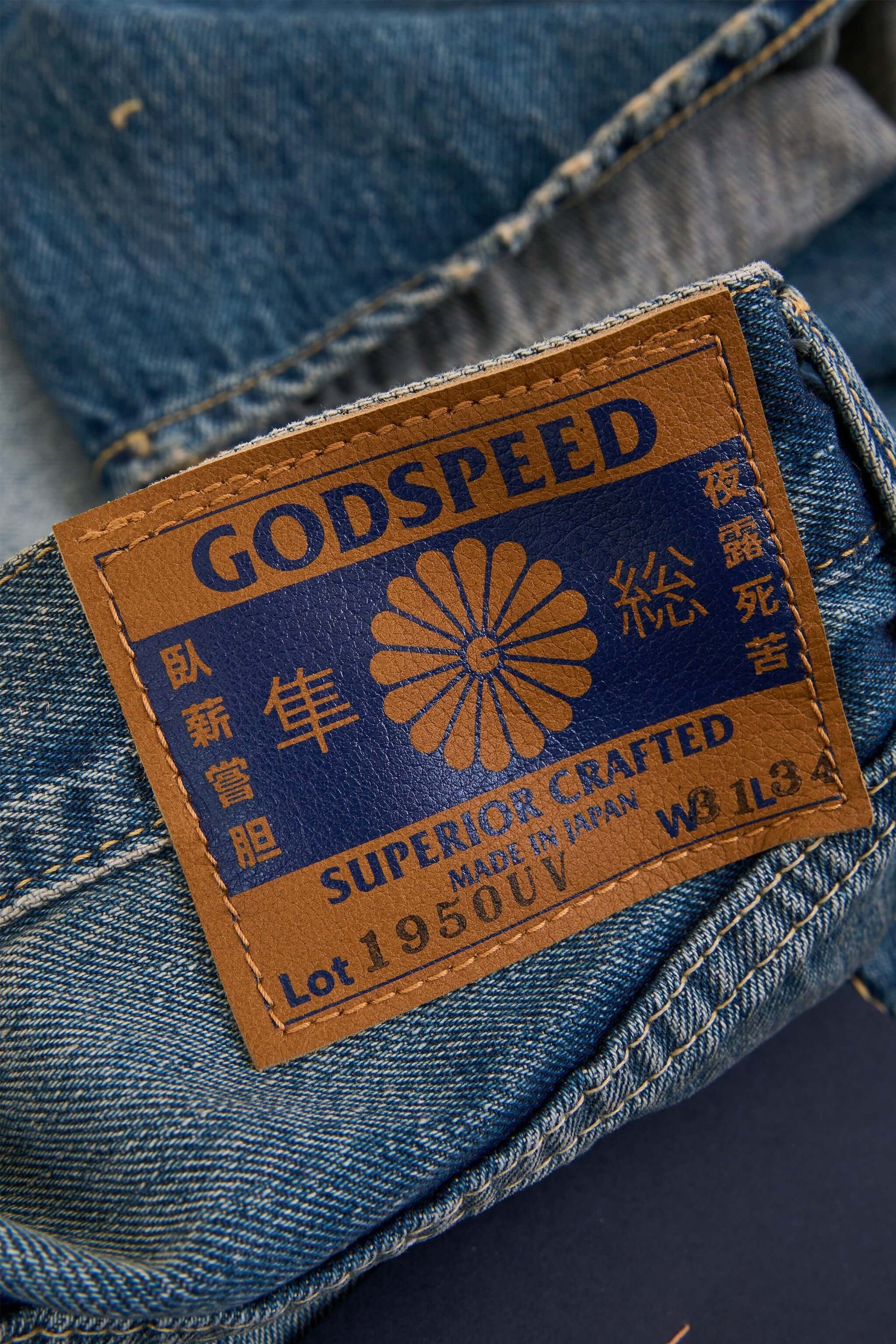 Godspeed 1950UV 13oz Vintage Wash Wide Straight Japanese Selvedge Jeans – leather patch with hand-stamped logo detail
