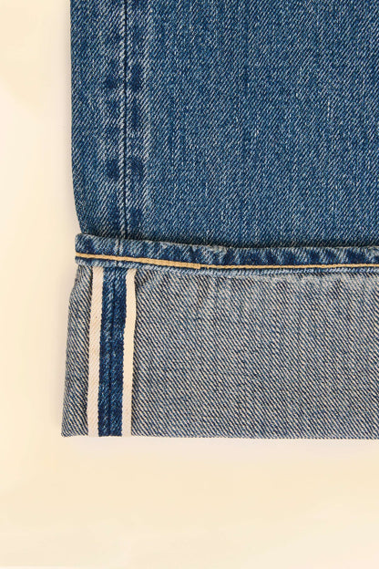 Godspeed 1950UV Selvedge Jeans – vintage wash chain-stitched hem and roping and selvedge ID close-up.